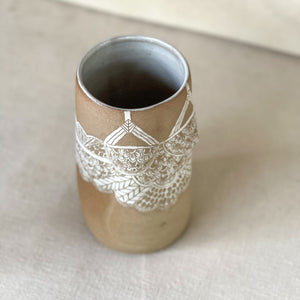 Brunnhilde Vase from Déesses de la nuit collection. Brown Body Stoneware Vase in the shape of the female form with sgraffito lacework done with white slip. Top view